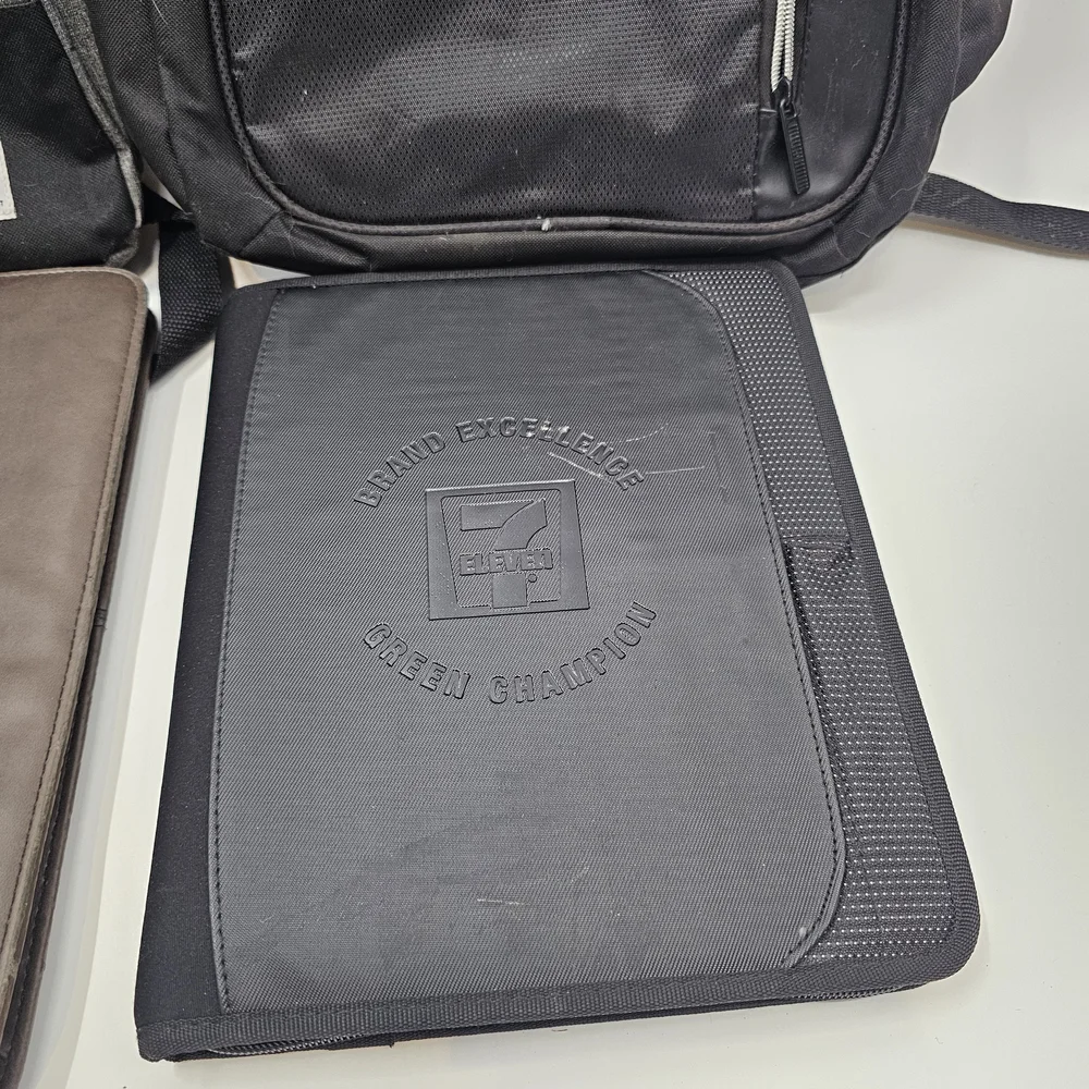 7-11 Logo Backpacks & Portfolio Binders Lot